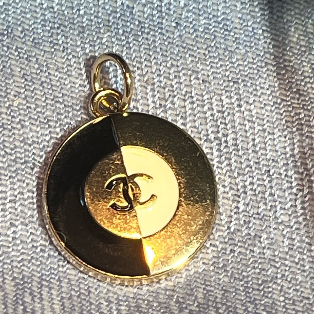 CHANEL Gold and Black Circular Pendant
